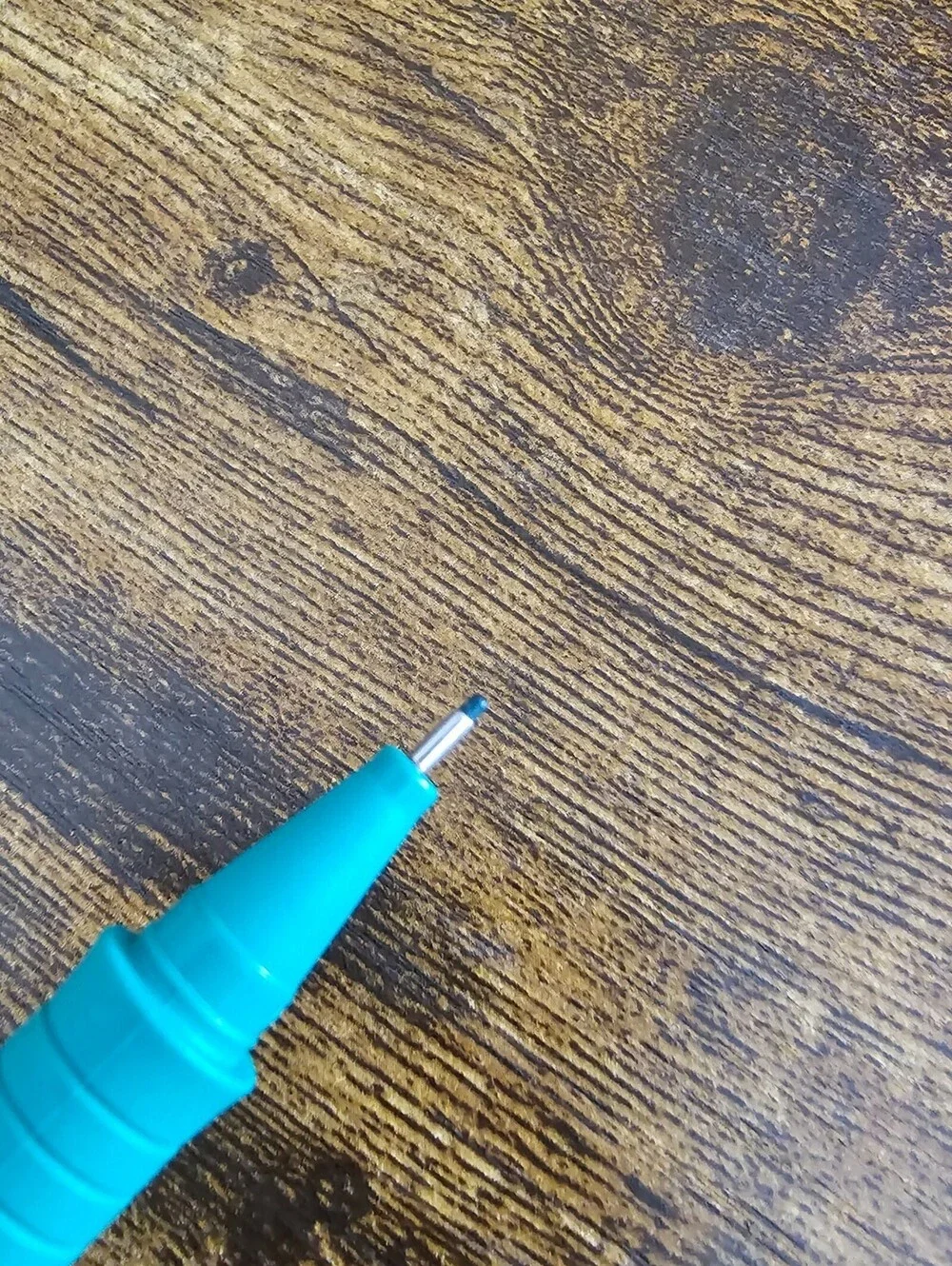 Faber-Castell Ecco Pigment fineliner blue pen with a turquoise barrel